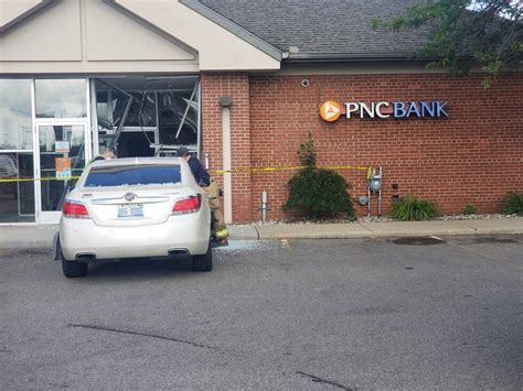 Car crashes into bank in Albany, crews respond
